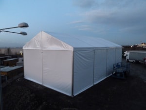 Temporary fabric hall on a construction site – side view, mobile roofing