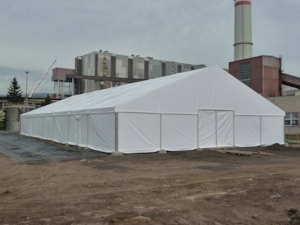 Long temporary hall near an industrial plant – fabric roofing for assembly works