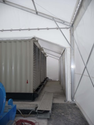 Temporary roofing for technology – service corridor next to equipment