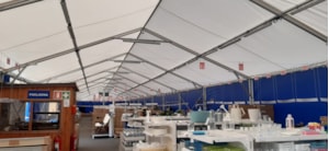 Fabric tent hall interior – covered sales area with blue sidewalls