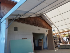 Fabric hall extension interior – connection to the building, covered workspace expansion