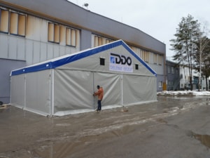 Tent hall extension in winter – side view with gable branding area