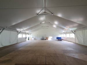 Insulated tent hall with a large interior space for year-round use