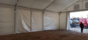 Insulated tent hall with a side interior view and an open entrance